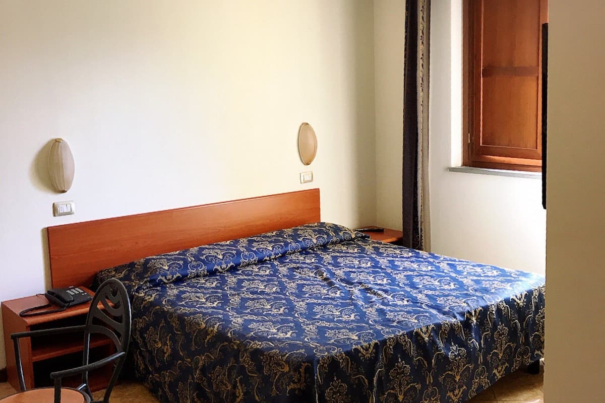 hypo-allergenic bedding, down duvets, minibar, in-room safe