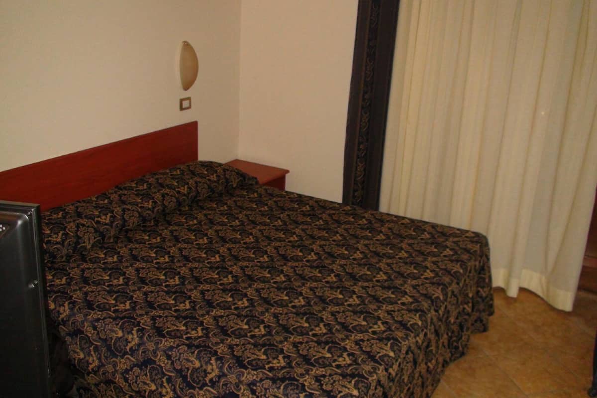 hypo-allergenic bedding, down duvets, minibar, in-room safe