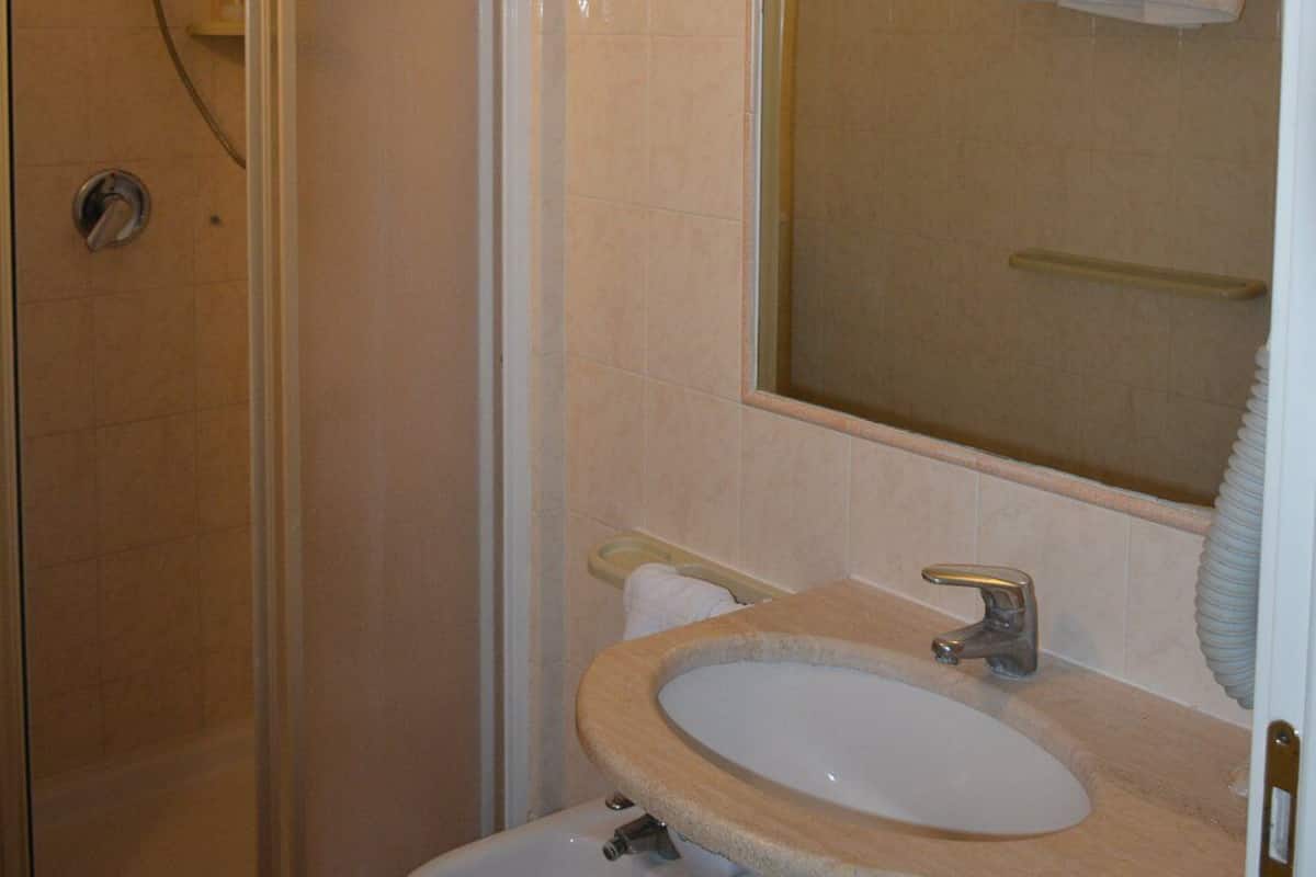 shower, rainfall showerhead, designer toiletries, hair dryer