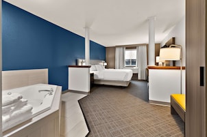 Suite, 1 King Bed, Non Smoking, Hot Tub | In-room safe, desk, laptop workspace, soundproofing