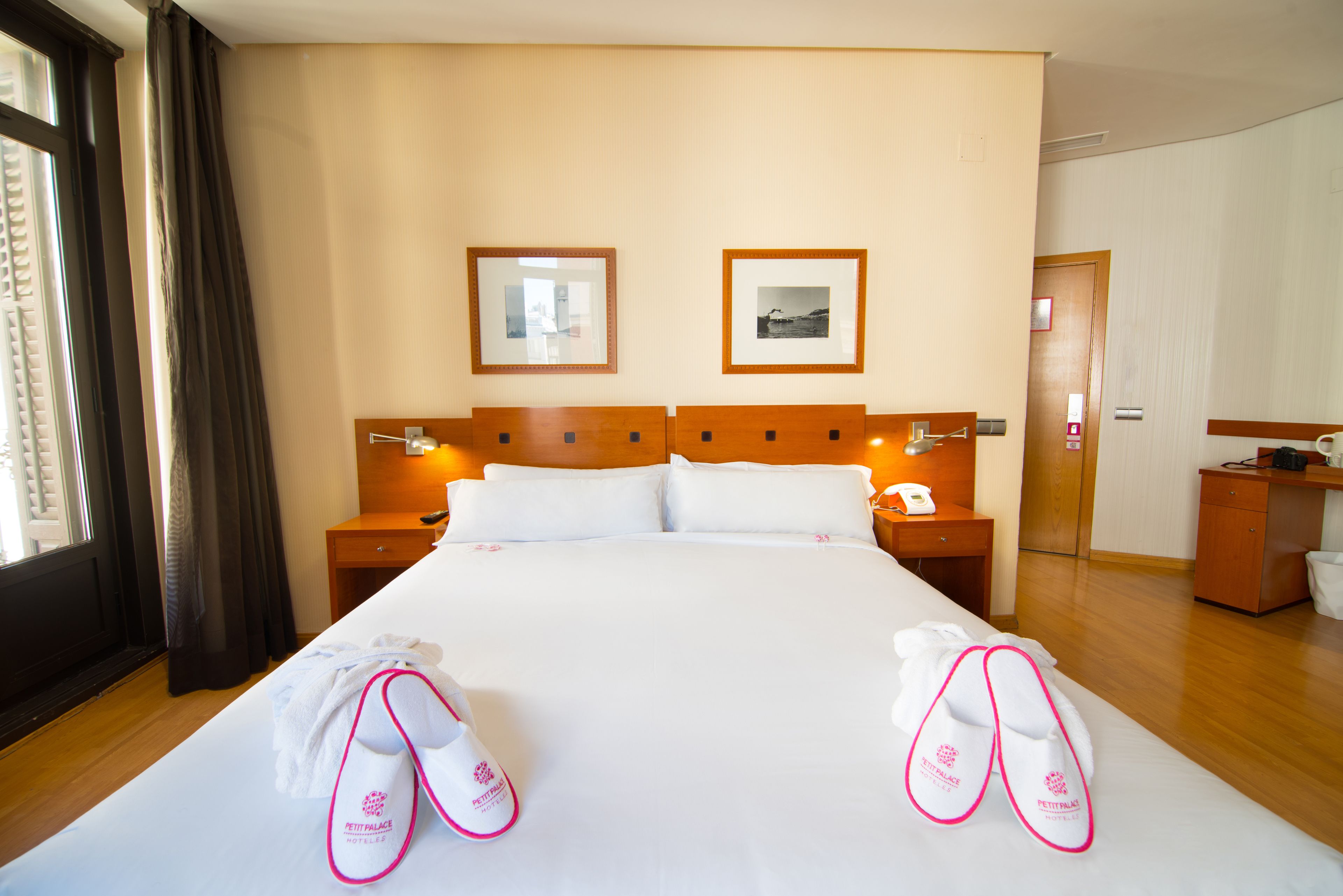 superior quadruple room, balcony | minibar, in-room safe, desk, blackout curtains