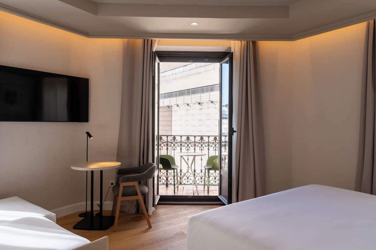 Superior Quadruple Room, Balcony | Minibar, in-room safe, desk, blackout drapes