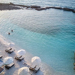 Private beach, white sand, free beach cabanas, sun-loungers