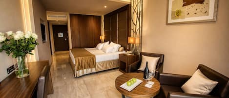 Deluxe Room, Partial Sea View | In-room safe, desk, laptop workspace, soundproofing