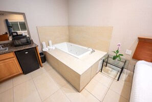 Studio Suite, 1 King Bed, Non Smoking | Pillow-top beds, in-room safe, desk, iron/ironing board