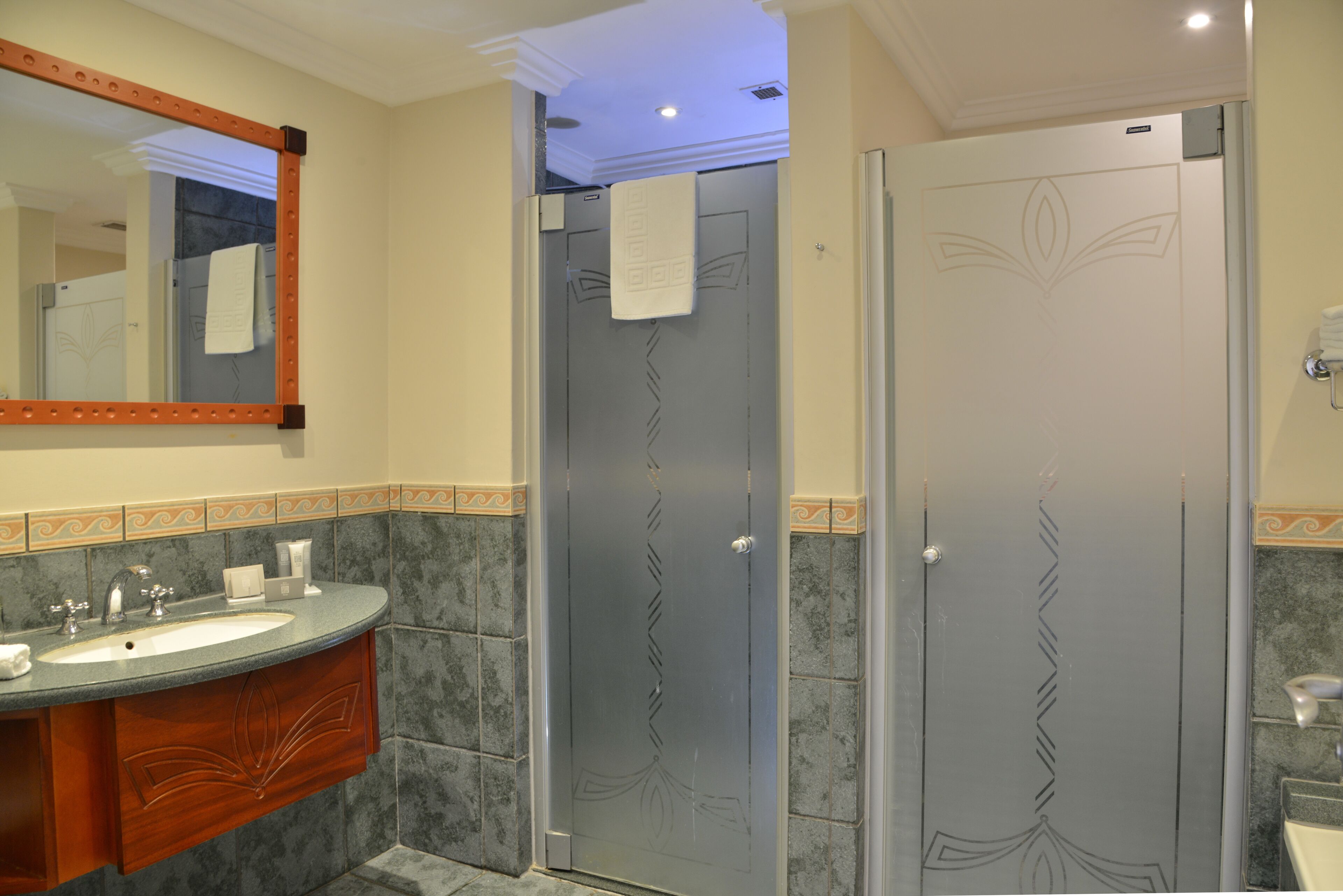 separate bathtub and shower, deep-soaking bathtub, free toiletries