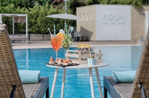Seasonal outdoor pool, pool umbrellas, sun loungers