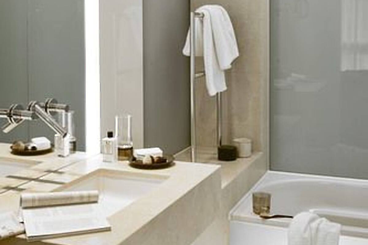 designer toiletries, hair dryer, bathrobes, slippers