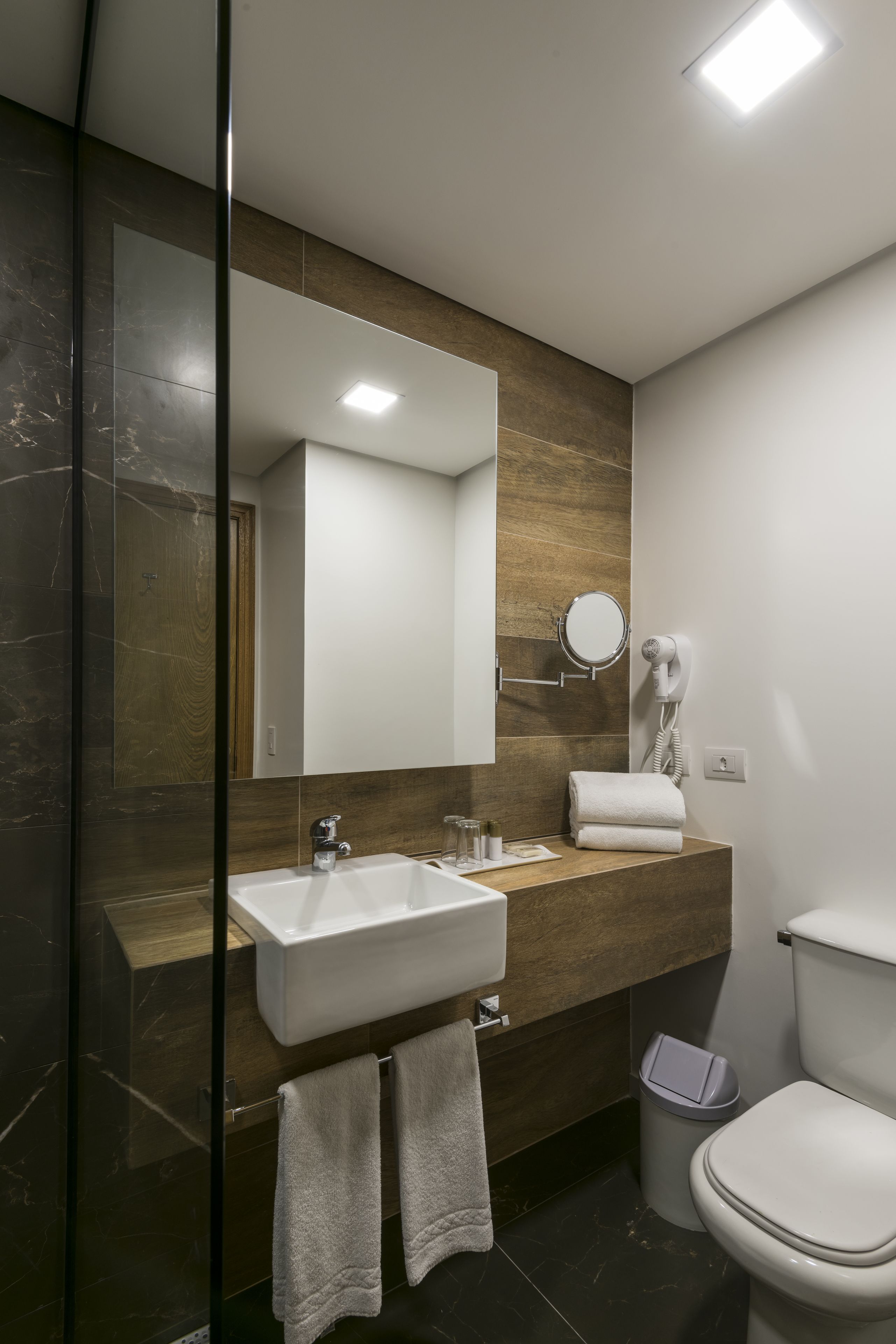 shower, eco-friendly toiletries, hair dryer, towels