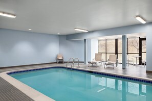 Indoor pool, open 8:00 AM to 11:00 PM, pool loungers