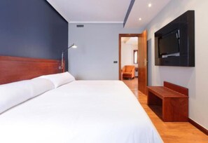 Ropa de cama de alta calidad, edredón y minibar 