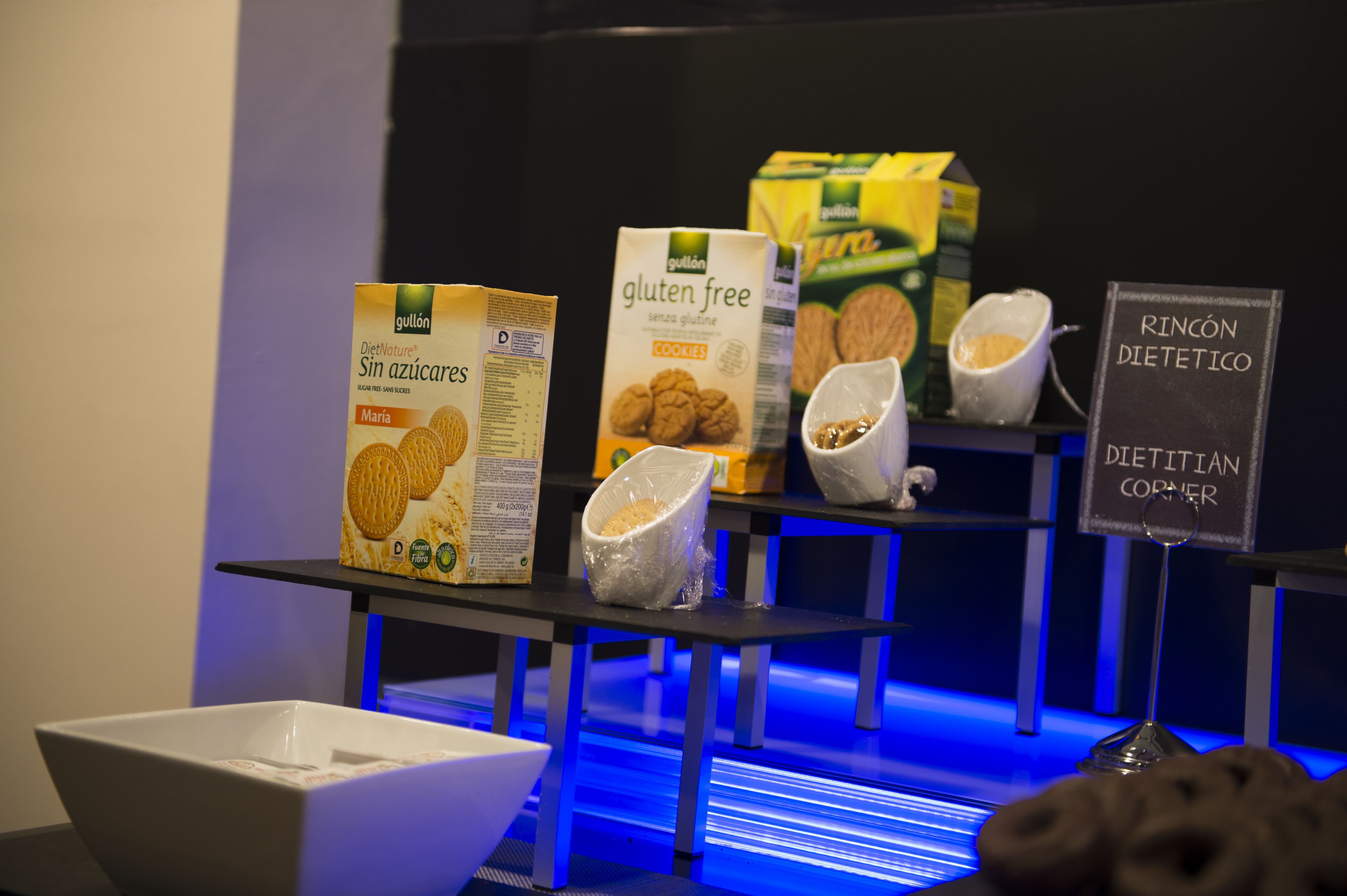 A display of gluten-free cookies and a sign indicating a dietetic corner.