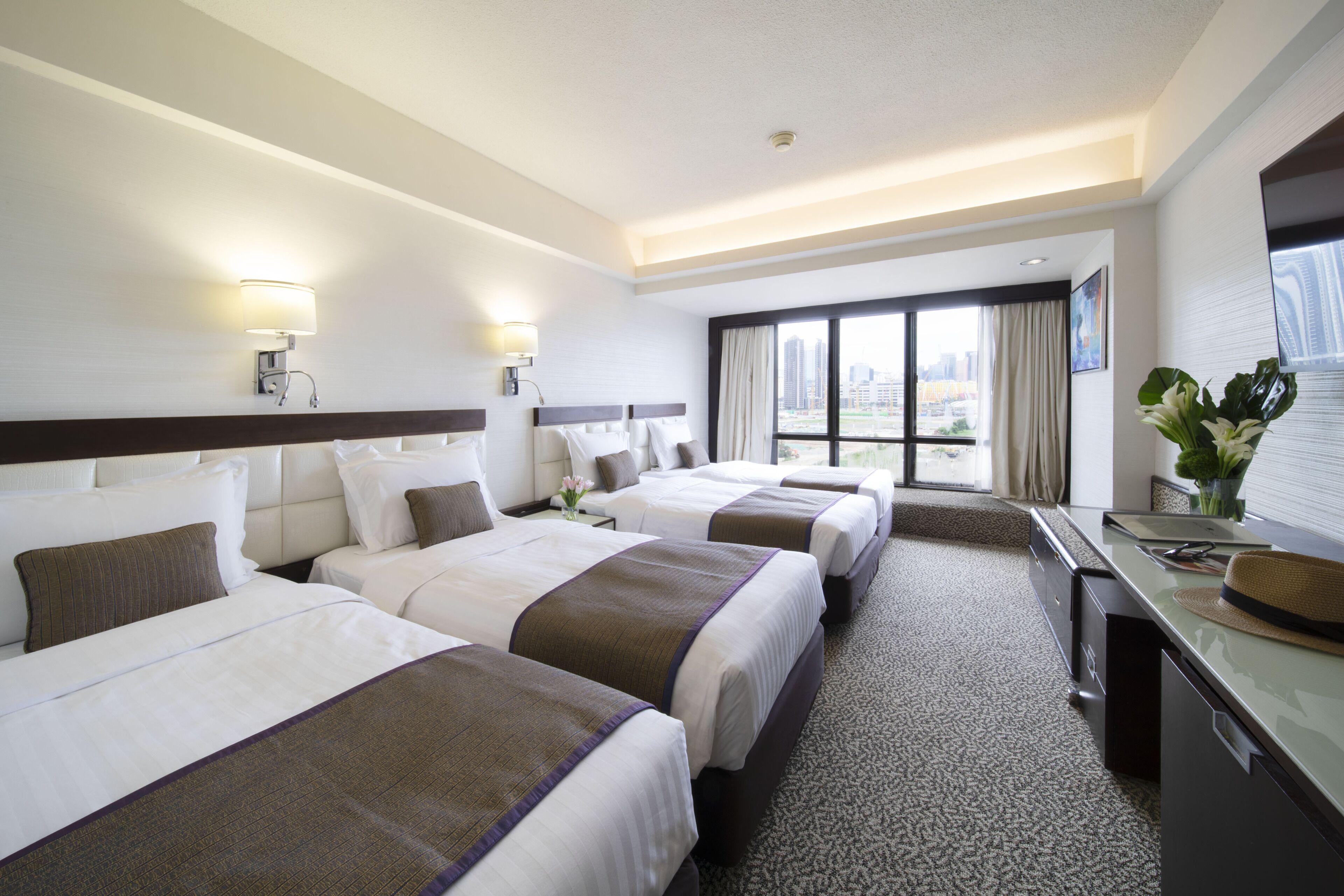 Family Quadruple Room | Hypo-allergenic bedding, in-room safe, desk, blackout drapes