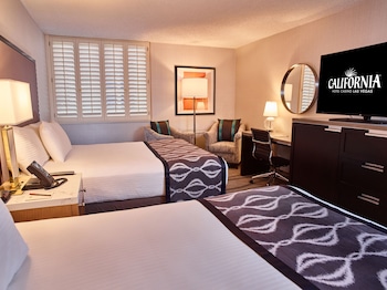 In-room safe, desk, laptop workspace, iron/ironing board at California Hotel and Casino