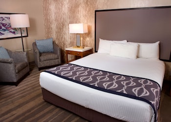 In-room safe, desk, laptop workspace, iron/ironing board at California Hotel and Casino