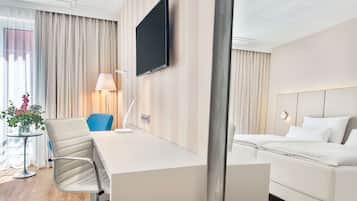 Hypo-allergenic bedding, minibar, in-room safe, desk