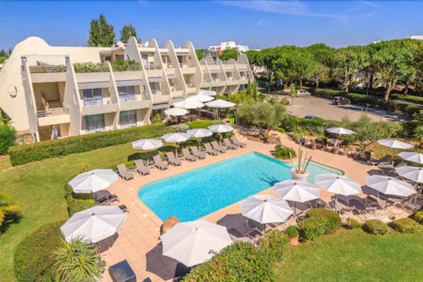 Outdoor pool, open 9:00 AM to 8:00 PM, pool umbrellas, sun loungers