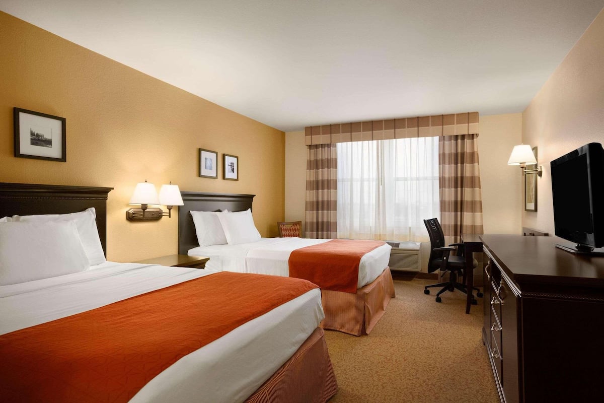 Hypo-allergenic bedding available, down comforters, desk