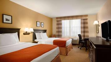 Hypo-allergenic bedding, down comforters, desk, laptop workspace