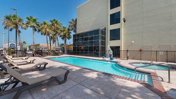 Seasonal outdoor pool, a heated pool, sun loungers