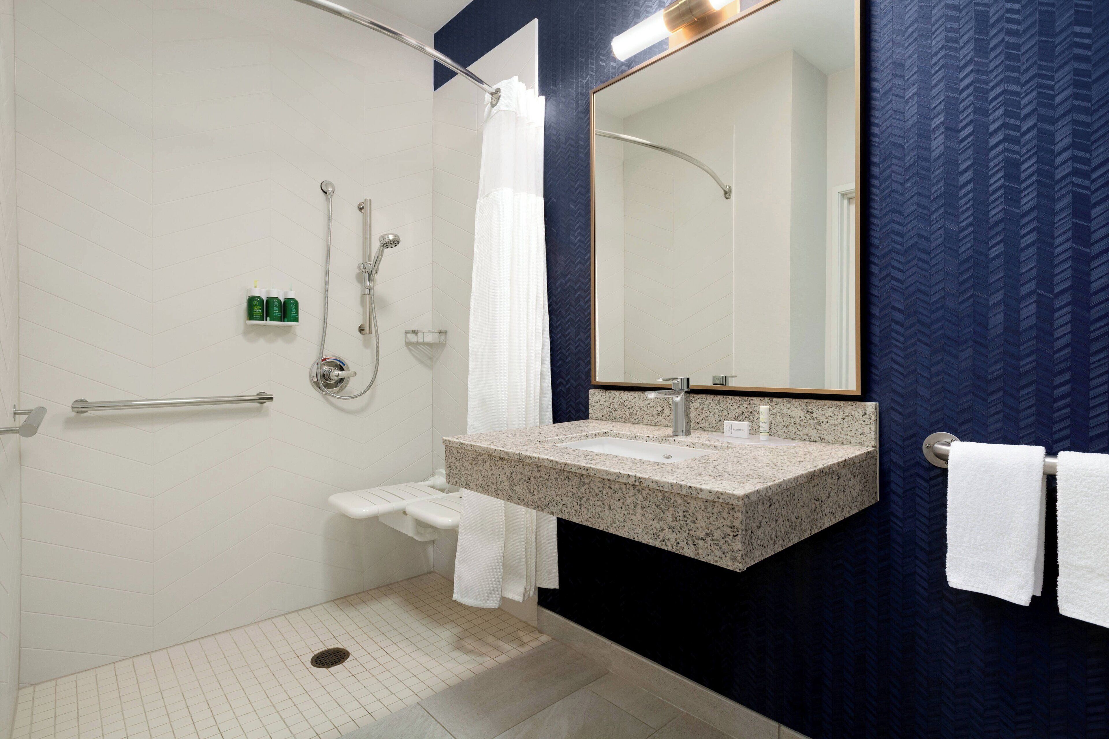 combined shower/bathtub, free toiletries, hair dryer, towels