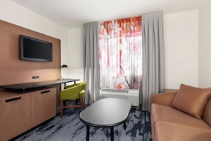 Room, 1 King Bed with Sofa bed | Living area | TV