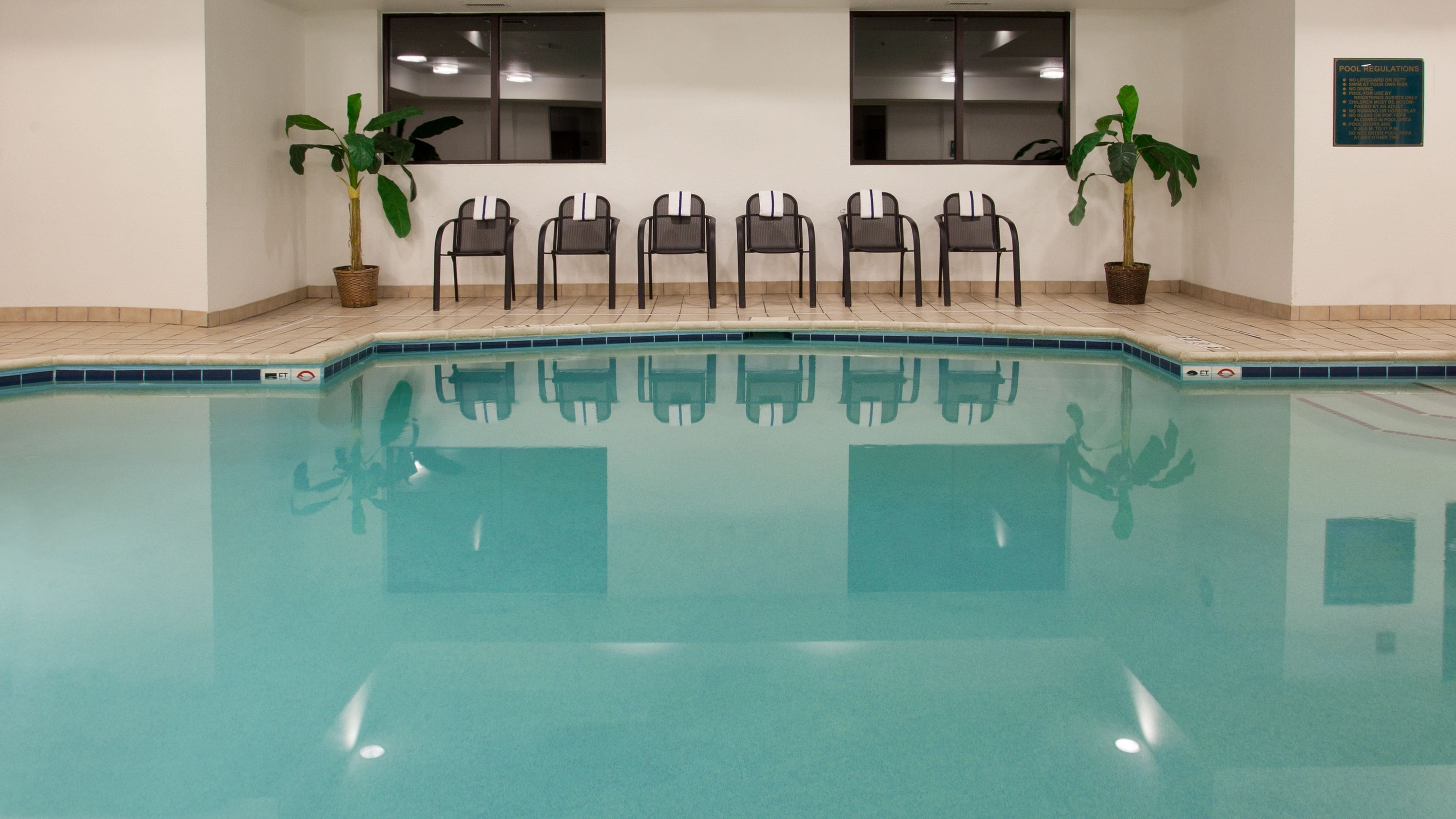 indoor pool, open 7:00 am to 10:00 pm, pool loungers
