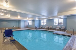 Indoor pool, open 7:00 AM to 10:00 PM, pool loungers