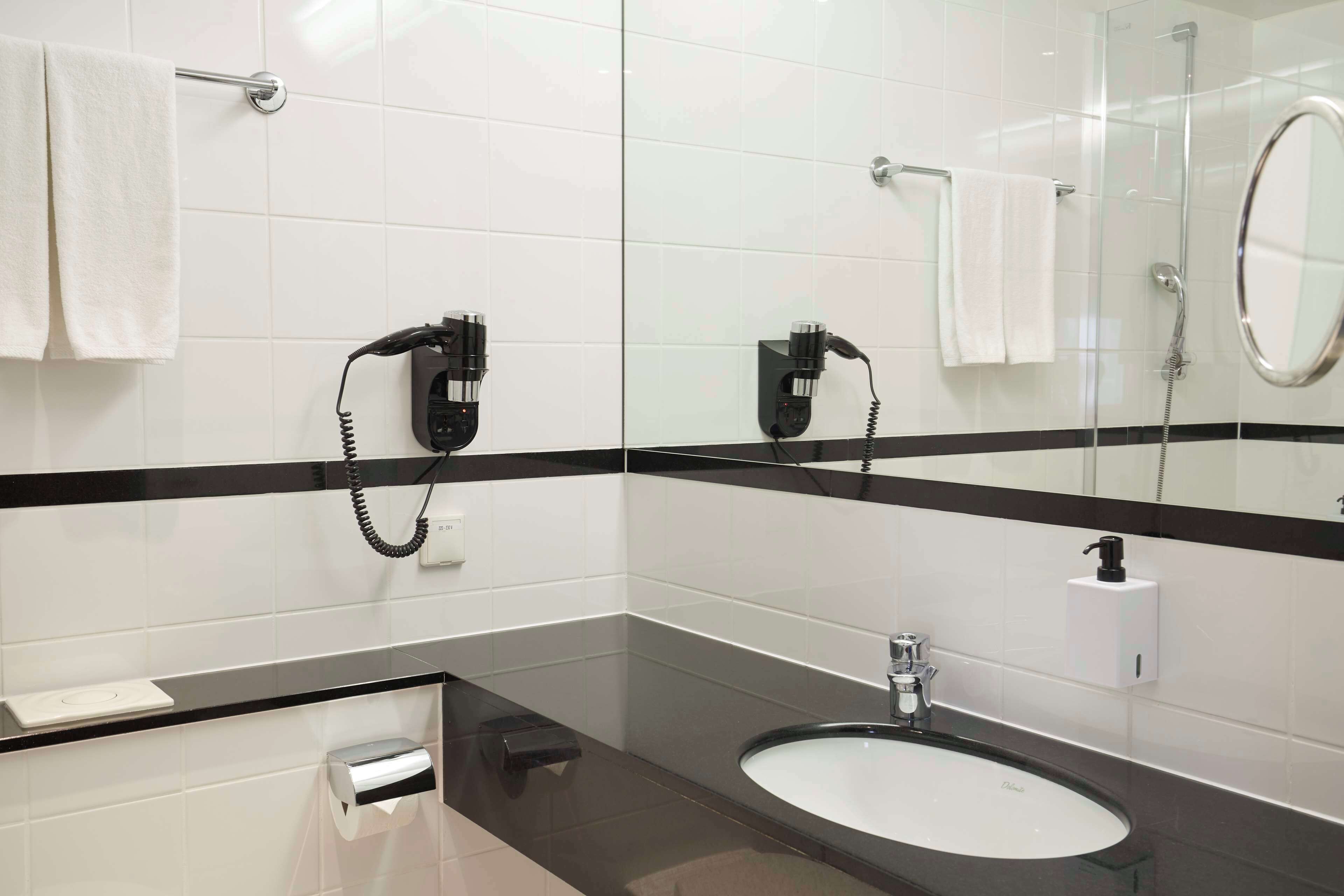 combined shower/bathtub, deep-soaking bathtub, eco-friendly toiletries