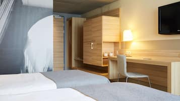 Standard Twin Room (Standard Plus) | In-room safe, desk, laptop workspace, blackout drapes