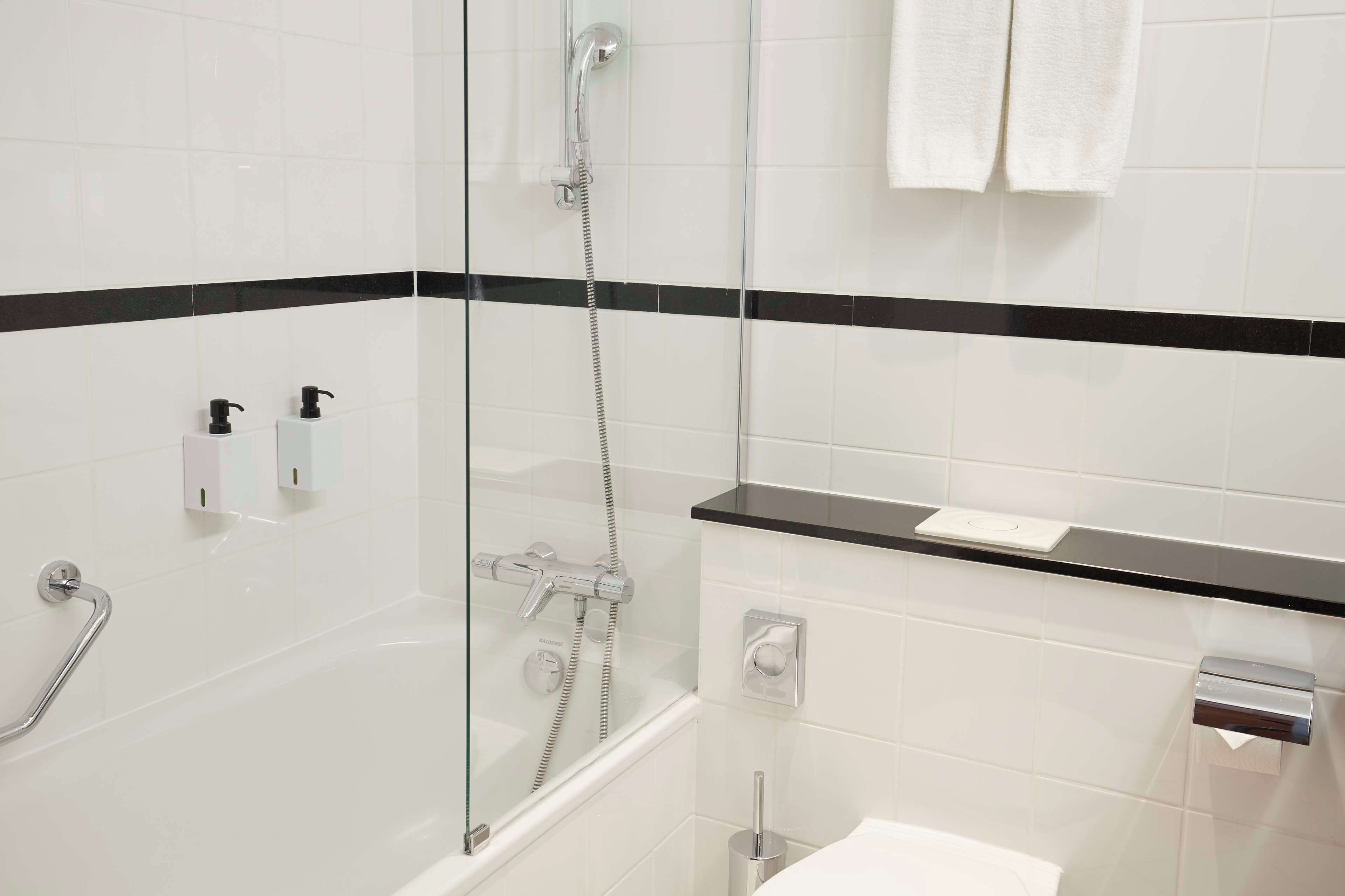 combined shower/bathtub, deep-soaking bathtub, eco-friendly toiletries