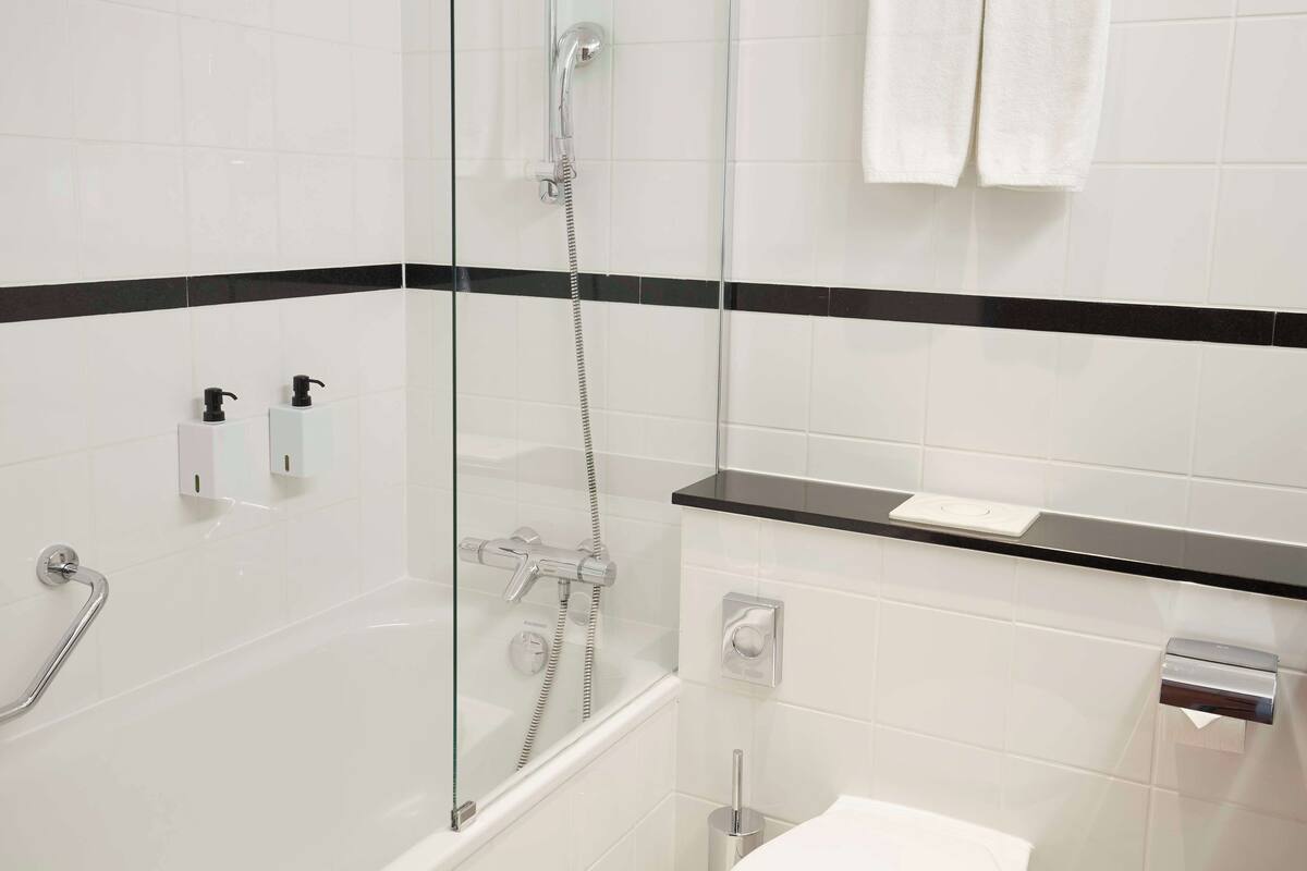 combined shower/bathtub, deep-soaking bathtub, eco-friendly toiletries