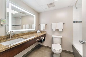 Suite, 1 King Bed, Non Smoking (with Sofabed) | Bathroom | Free toiletries, hair dryer, towels, soap