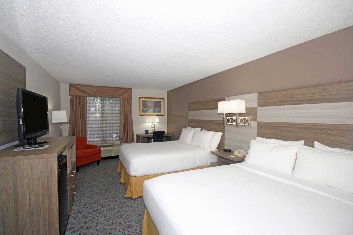 Down comforters, pillowtop beds, desk, laptop workspace