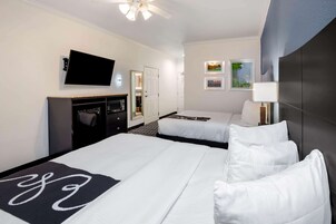 Premium bedding, desk, iron/ironing board, free rollaway beds