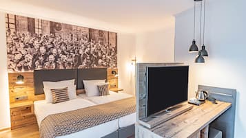 Junior-Suite, Balkon, Gartenblick | Minibar, Zimmersafe, Schreibtisch, schallisolierte Zimmer
