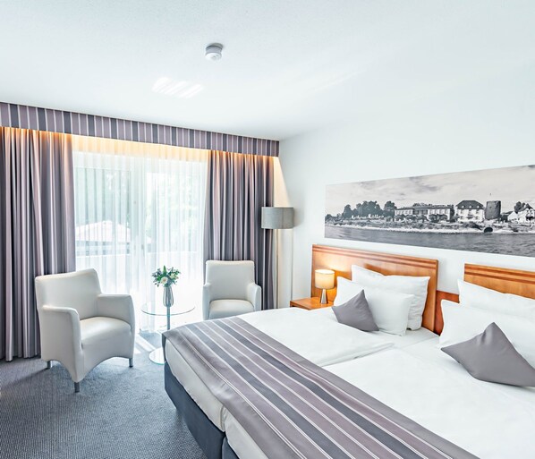 Standard Double Room Single Use, Garden View | Minibar, in-room safe, desk, soundproofing