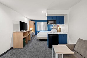Studio, 1 King Bed | Living area | 50-inch Smart TV with cable channels