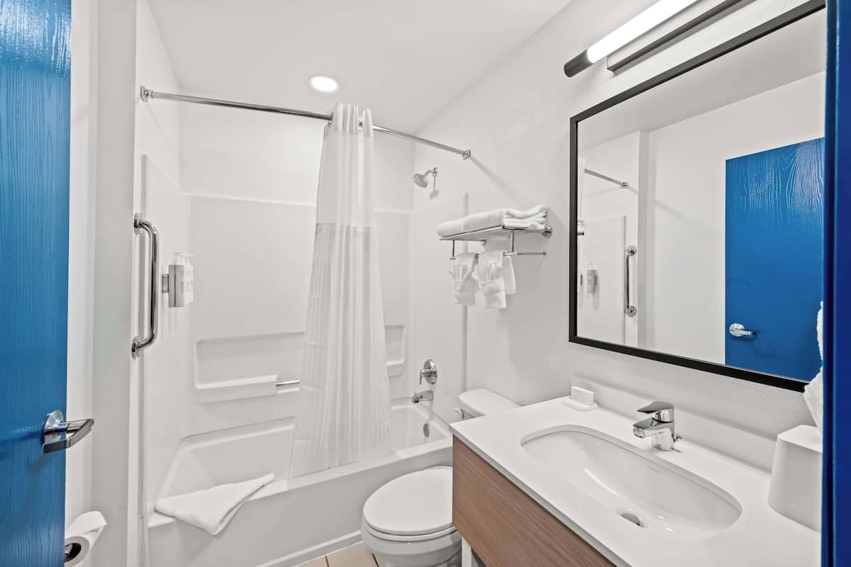 studio, 1 king bed | bathroom | free toiletries, hair dryer, towels