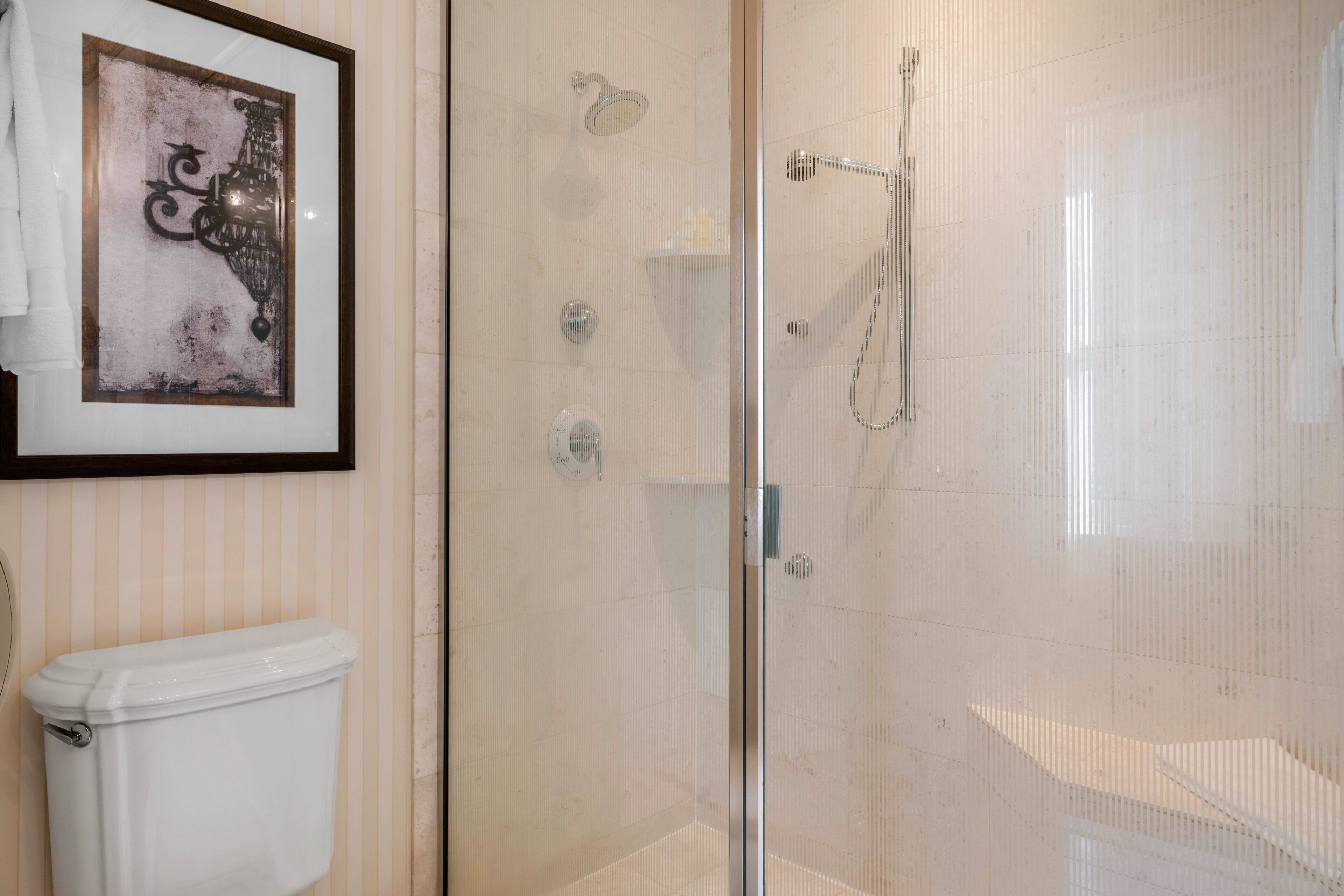 Combined shower/tub, designer toiletries, hair dryer, bathrobes