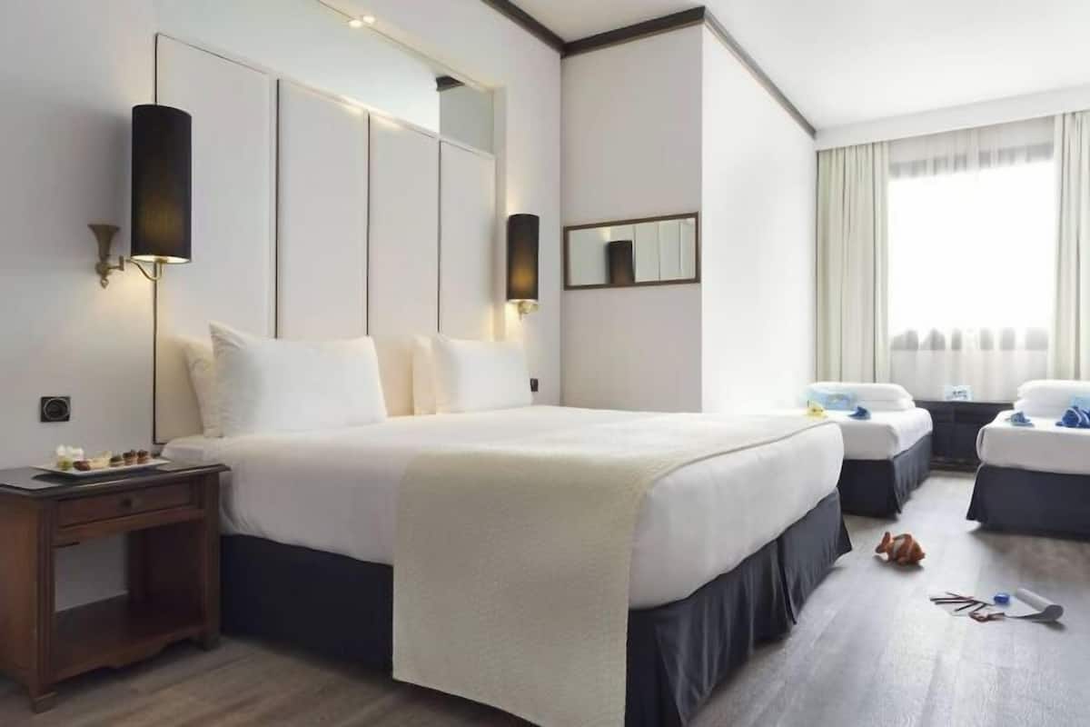 1 habitación, edredón, camas con pillow-top y minibar