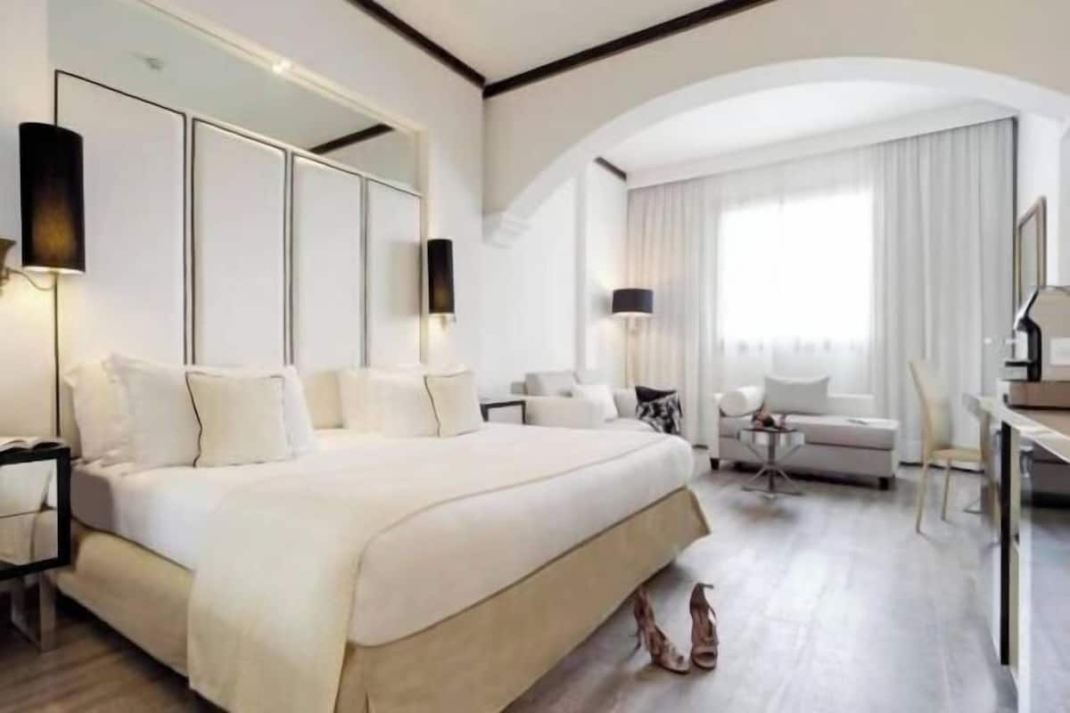 1 habitación, edredón, camas con pillow-top y minibar