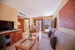 Garden, Balibed Suite | Living room | Flat-screen TV