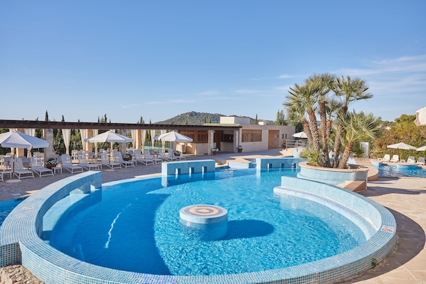 Indoor pool, outdoor pool, pool umbrellas