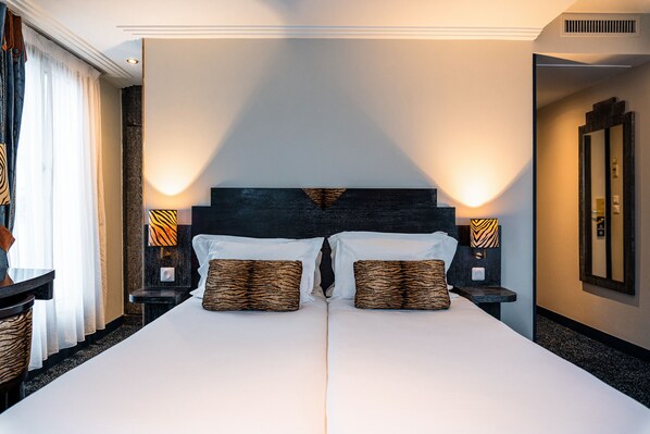 Triple Room | Premium bedding, minibar, in-room safe, desk