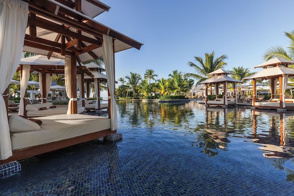 2 outdoor pools, open 9:00 AM to 7:00 PM, cabanas (surcharge)