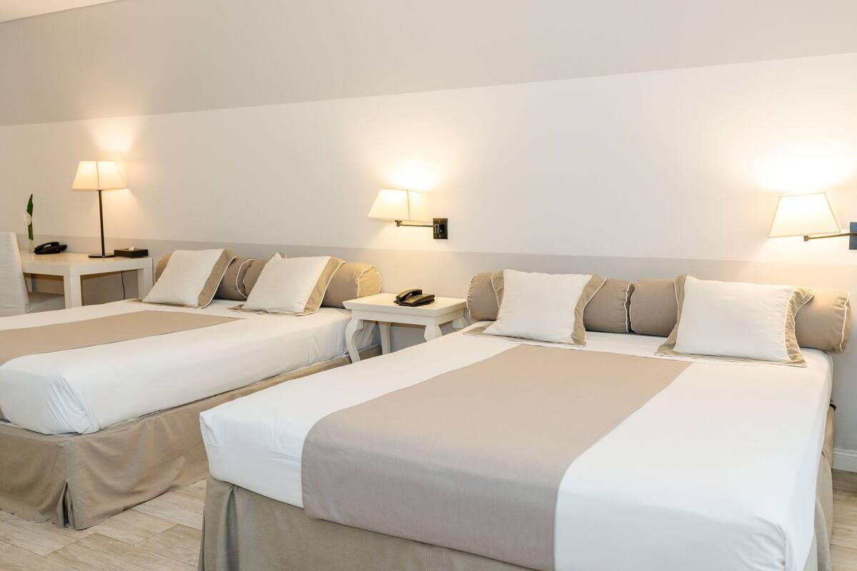 Premium bedding, down duvets, pillow-top beds, minibar