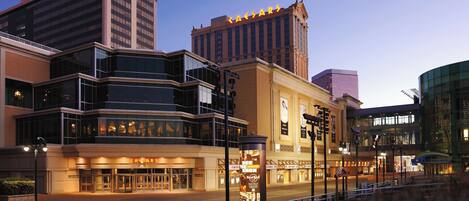 A hotel with a classic facade, multiple floors, and a prominent sign.