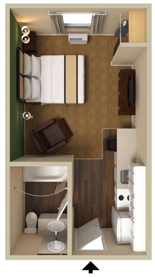 A compact studio apartment with a bed, kitchenette, bathroom, and a small seating area.