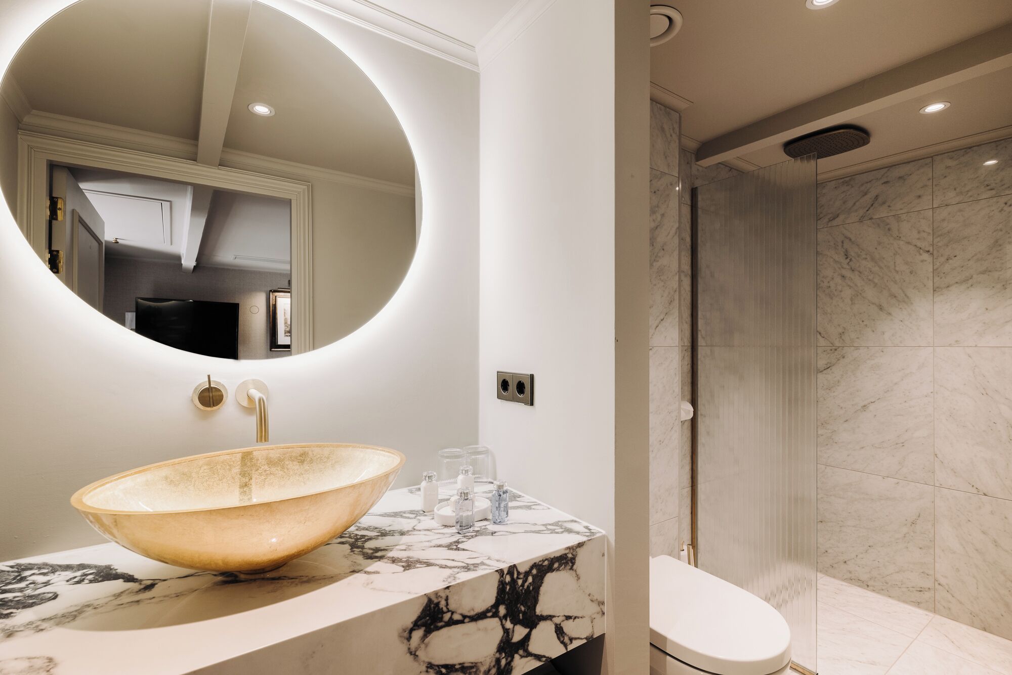 designer toiletries, hair dryer, bathrobes, towels